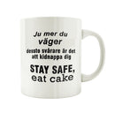 Porslinsmugg Stay safe eat cake