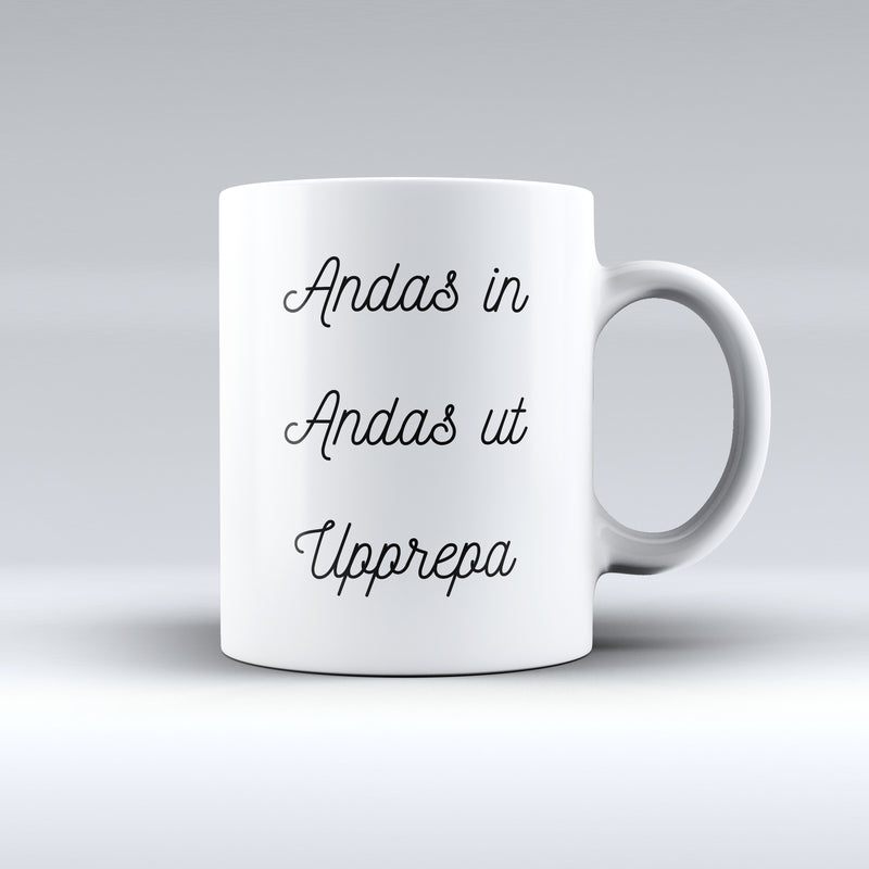 Porslinsmugg med texten "Andas in Andas ut"