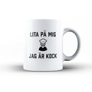 Porslinsmugg med texten "Lita på mig jag är kock"
