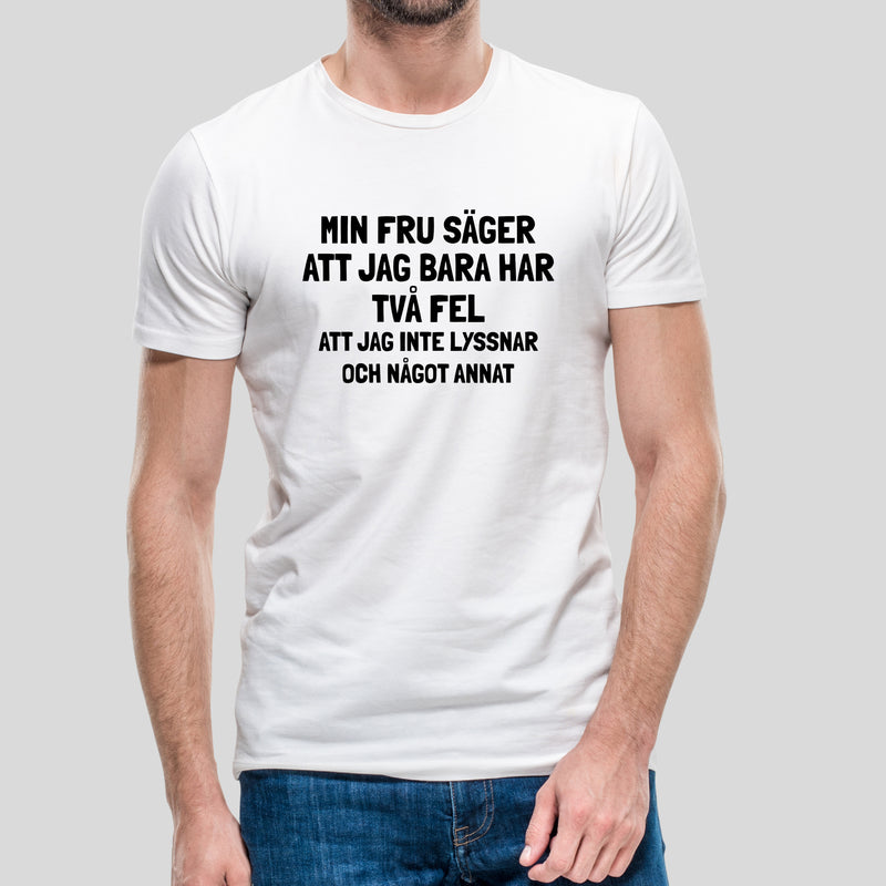 T-shirt med texten "Min fru säger att jag bara har två fel"
