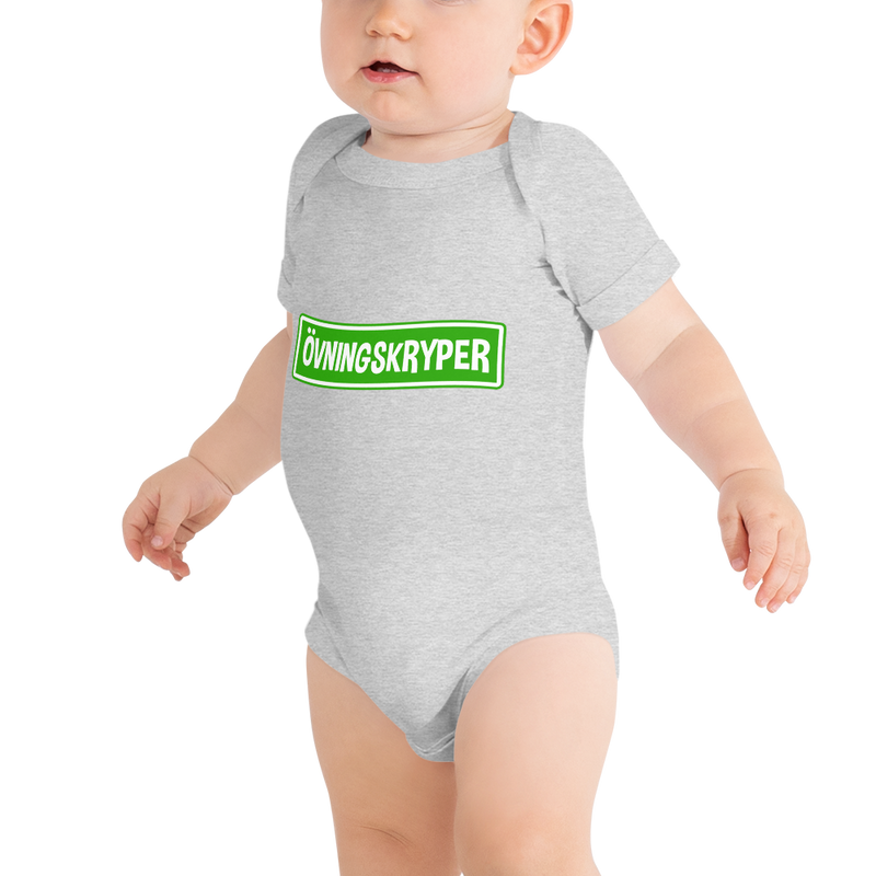 Babybody med texten "ÖVNINGSKRYPER"