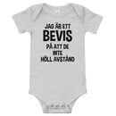 Babybody med texten "Jag är ett bevis"