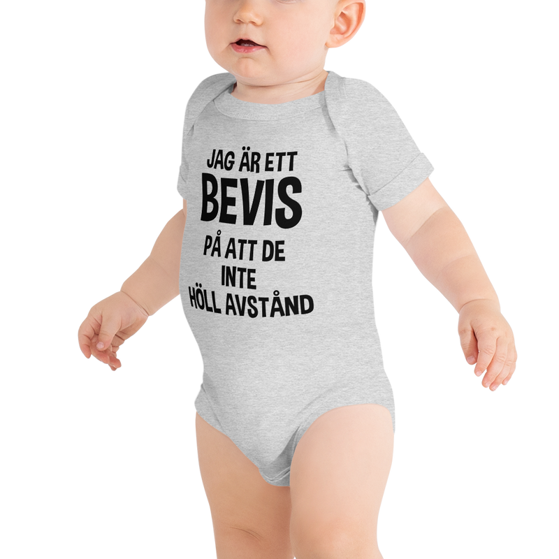 Babybody med texten "Jag är ett bevis"