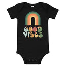 Babybody med texten "Good vibes"