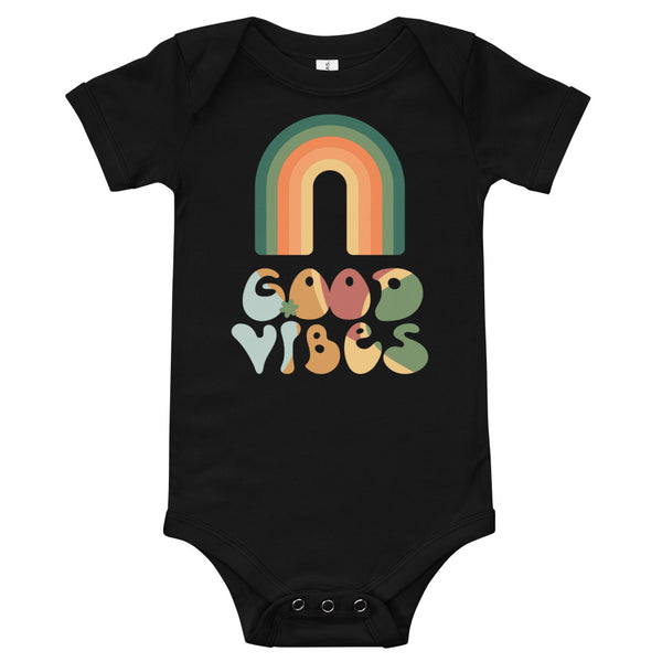 Babybody med texten "Good vibes"