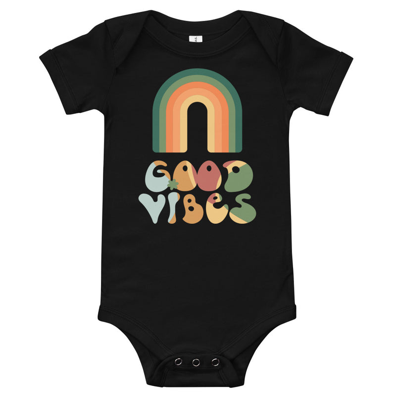 Babybody med texten "Good vibes"