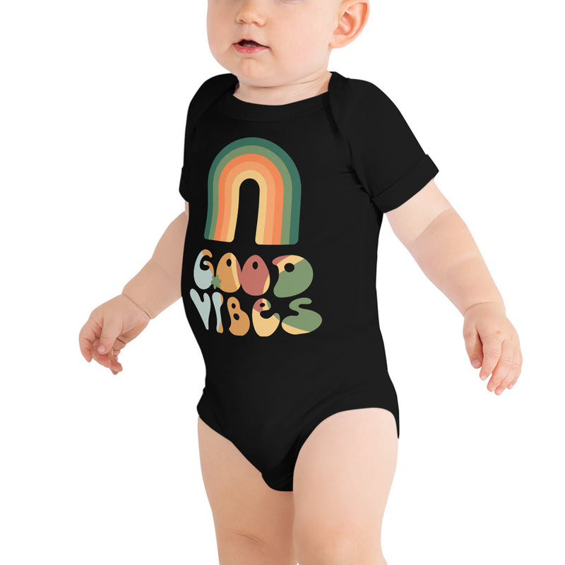 Babybody med texten "Good vibes"