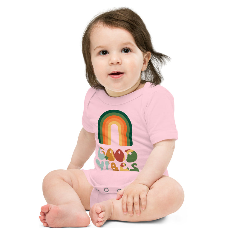 Babybody med texten "Good vibes"