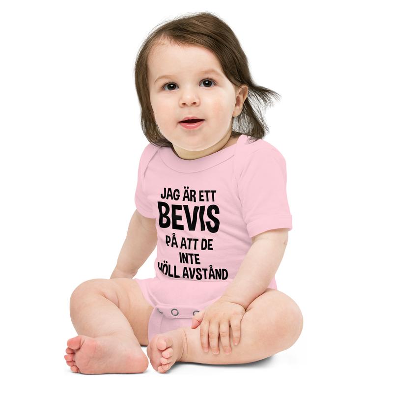 Babybody med texten "Jag är ett bevis"