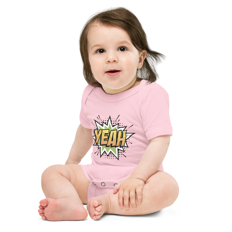 Babybody med texten "YEAH"