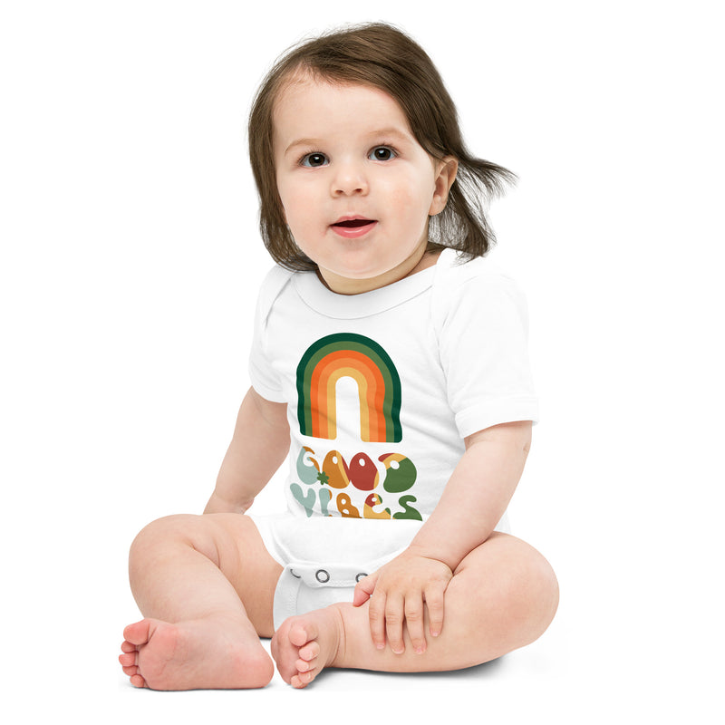 Babybody med texten "Good vibes"