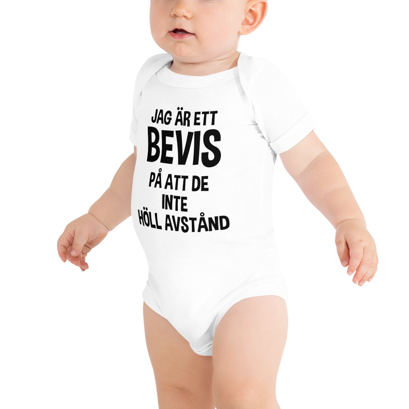 Babybody med texten "Jag är ett bevis"