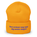 Mössa med broderad text - Det ordnar nog upp sig under dagen
