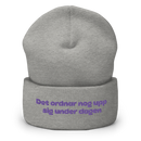 Mössa med broderad text - Det ordnar nog upp sig under dagen