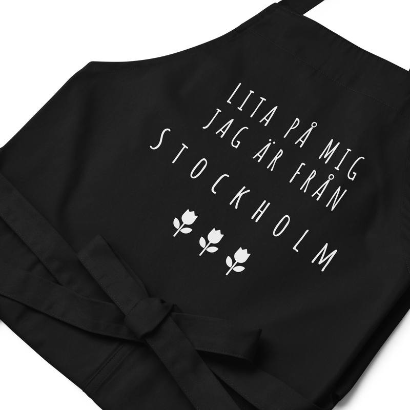 Förkläde med texten "Lita på mig jag är från stockholm"