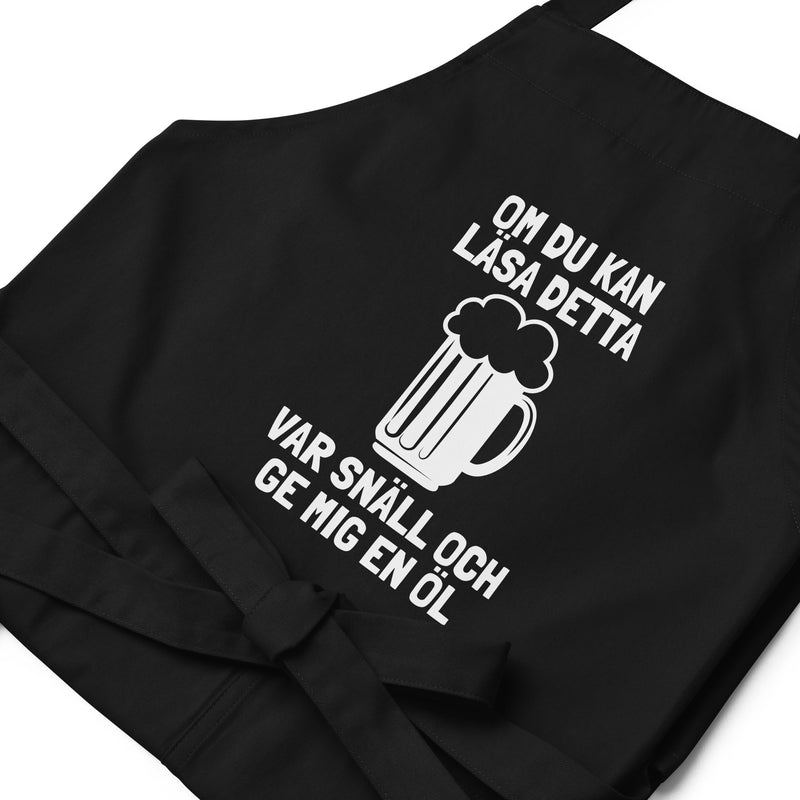 Förkläde med texten "Om du kan läsa detta"