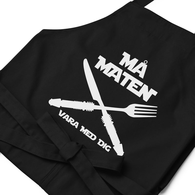 Förkläde med texten "Må maten vara med dig"