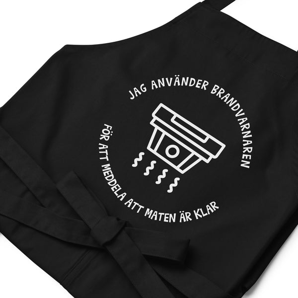 Förkläde med texten "Jag använder brandvarnaren"