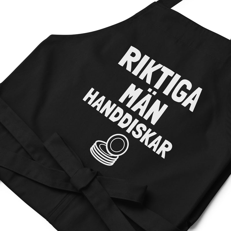 Förkläde med texten "Riktiga män handdiskar"