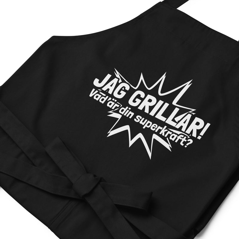 Förkläde med texten "Jag grillar, vad är din superkraft?"