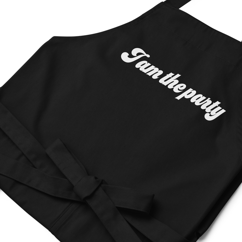 Förkläde med texten "I am the party"