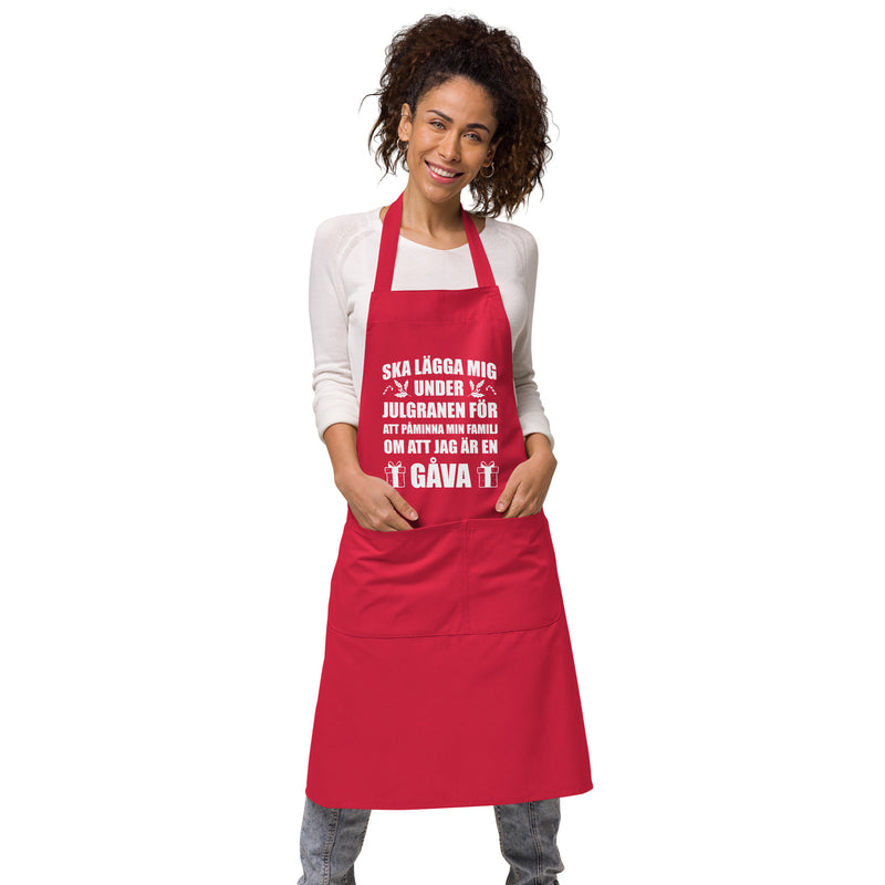 Förkläde med texten "Ska lägga mig under julgranen"