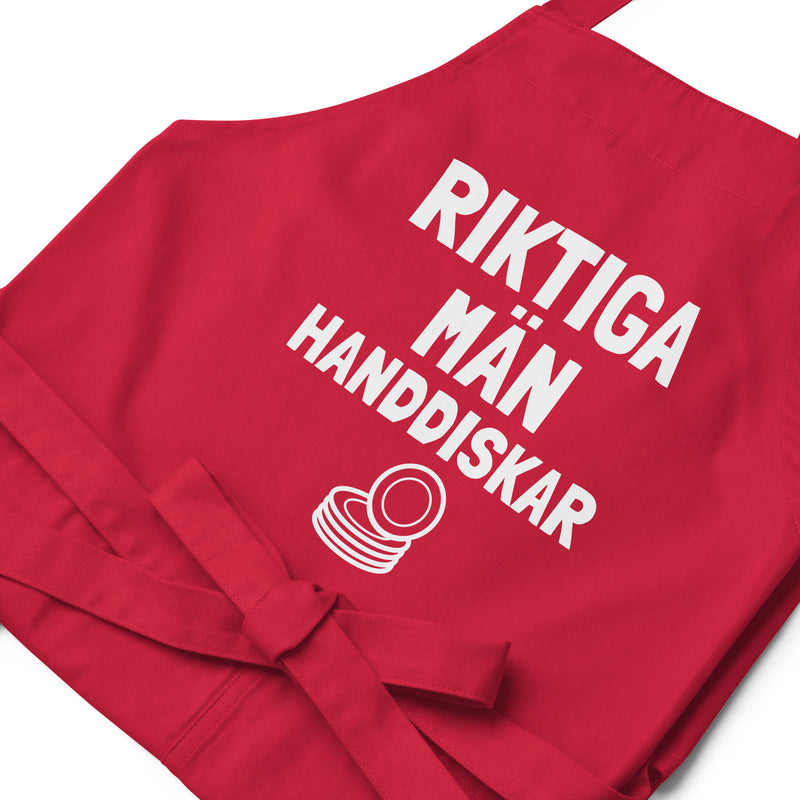 Förkläde med texten "Riktiga män handdiskar"