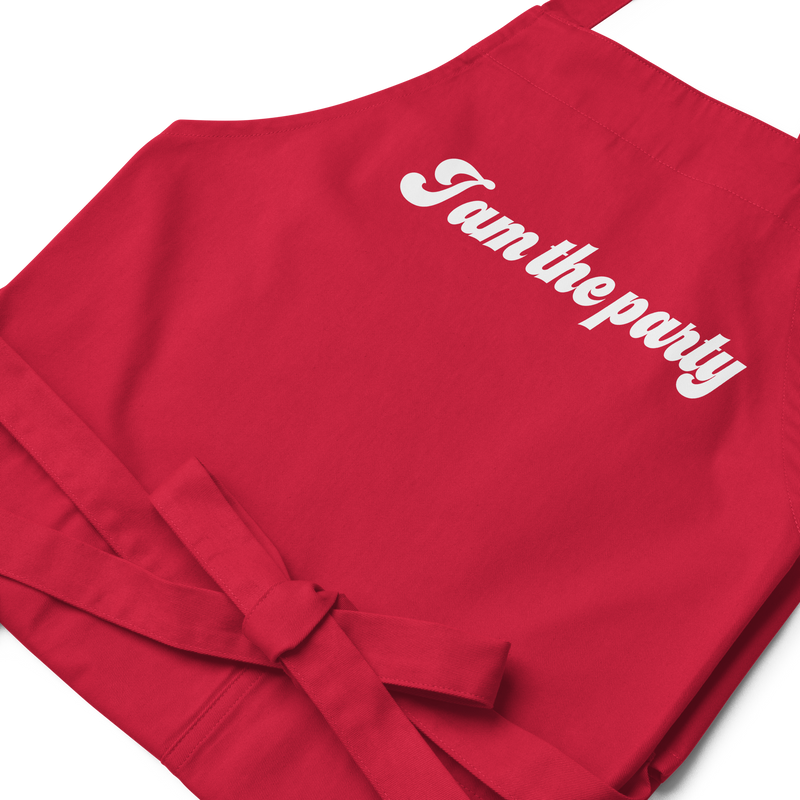 Förkläde med texten "I am the party"