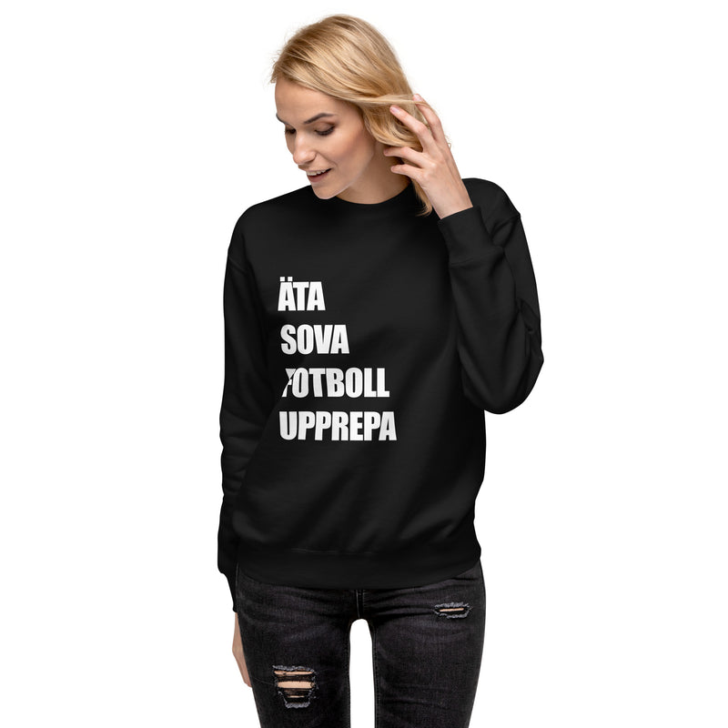 Sweatshirt med texten "ÄTA SOVA FOTBOLL UPPREPA"
