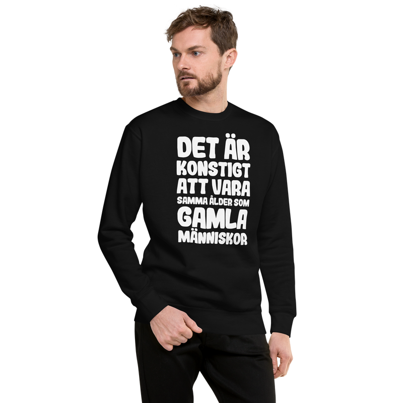 Sweatshirt med texten "Det är konstigt"