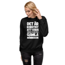 Sweatshirt med texten "Det är konstigt"