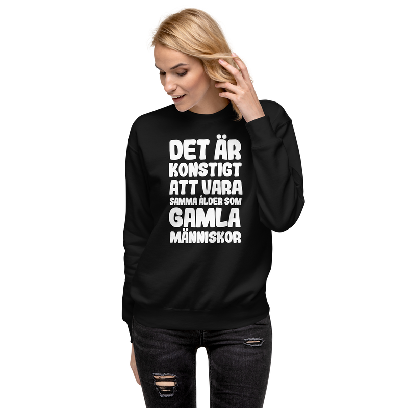 Sweatshirt med texten "Det är konstigt"