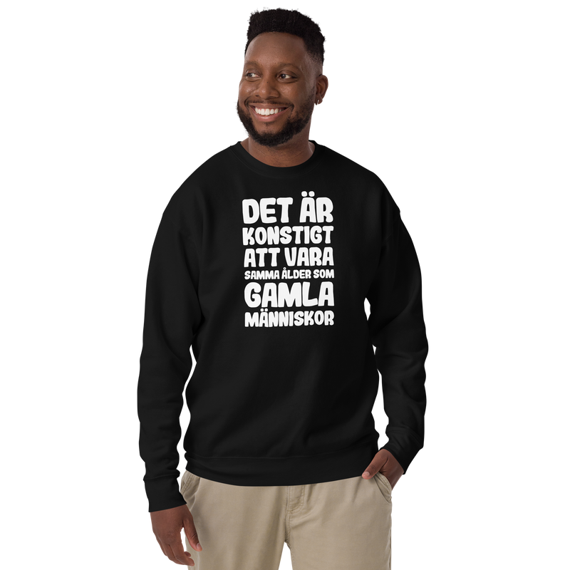 Sweatshirt med texten "Det är konstigt"