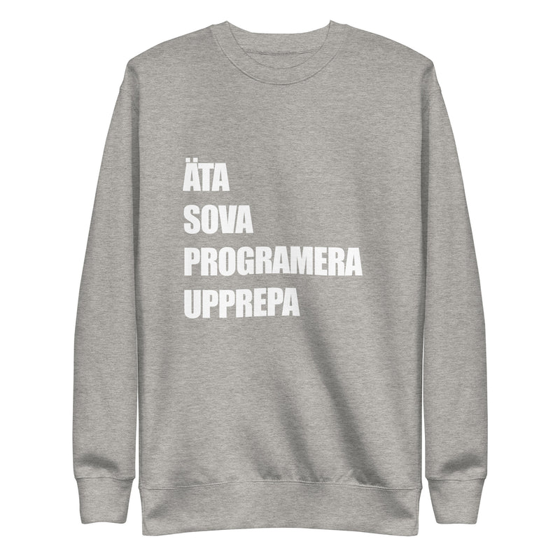 Sweatshirt med texten "ÄTA SOVA PROGRAMERA UPPREPA"