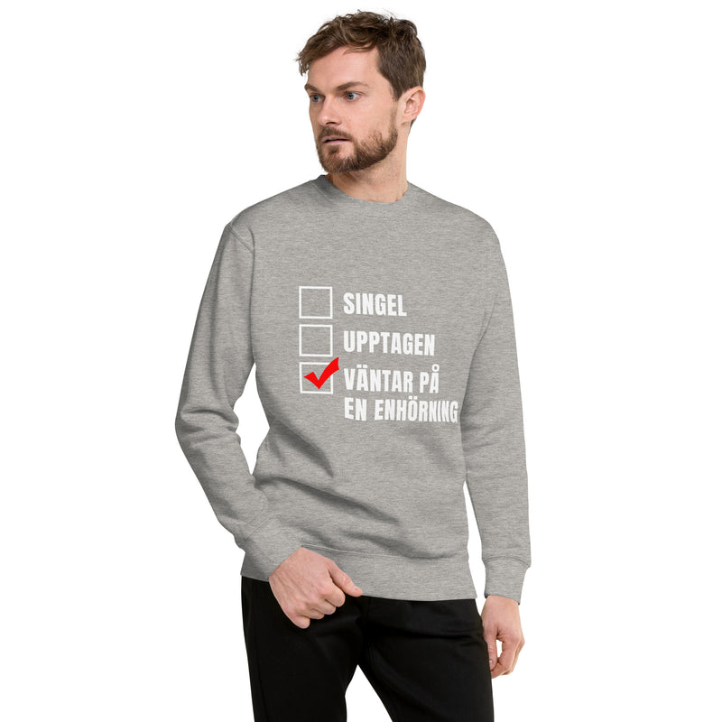Sweatshirt med texten "Väntar på en enhörning"