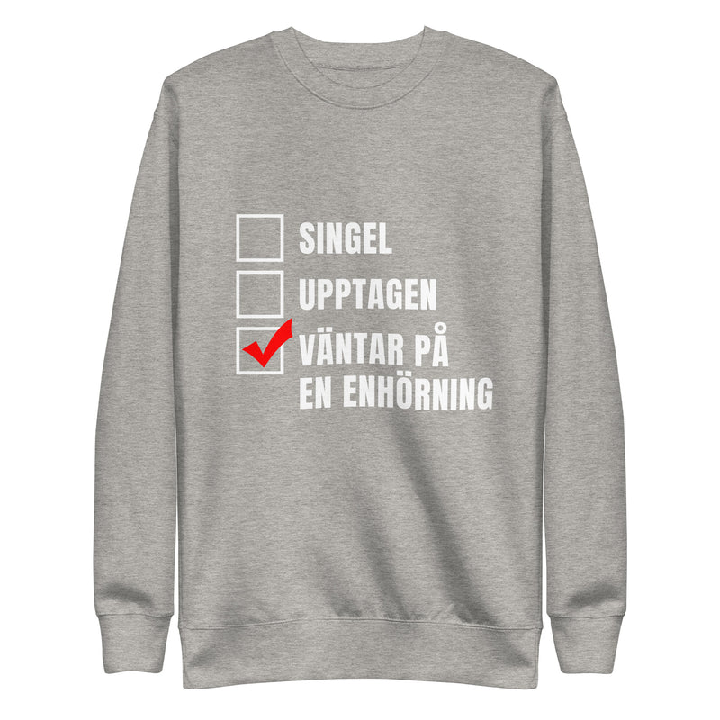 Sweatshirt med texten "Väntar på en enhörning"