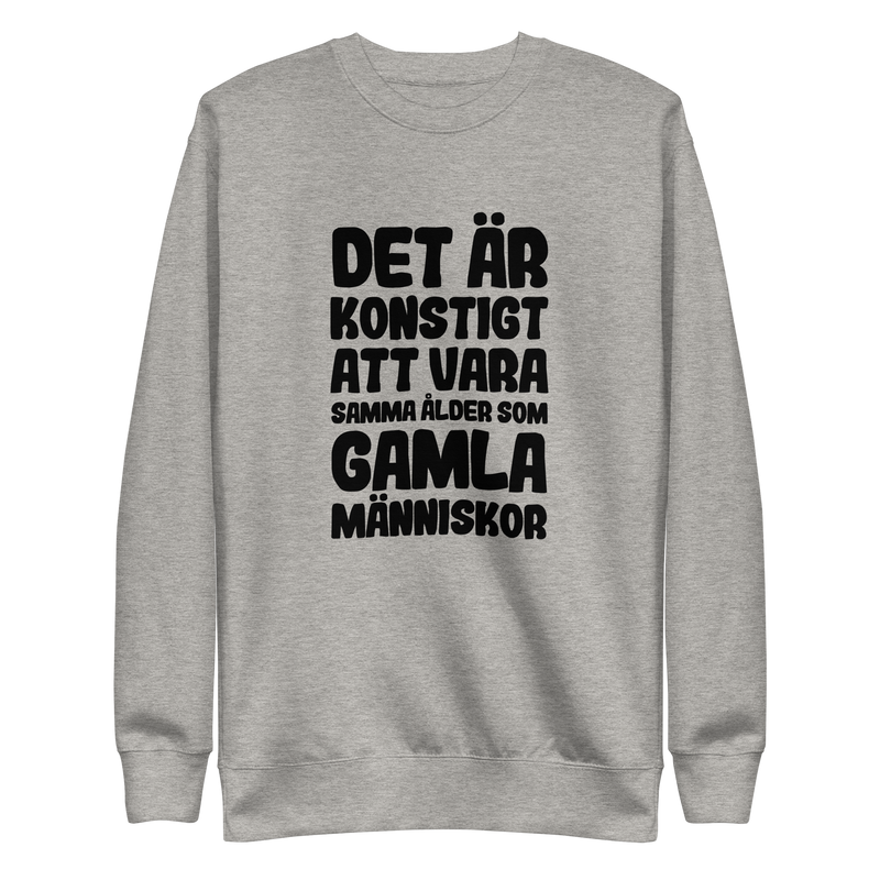 Sweatshirt med texten "Det är konstigt"