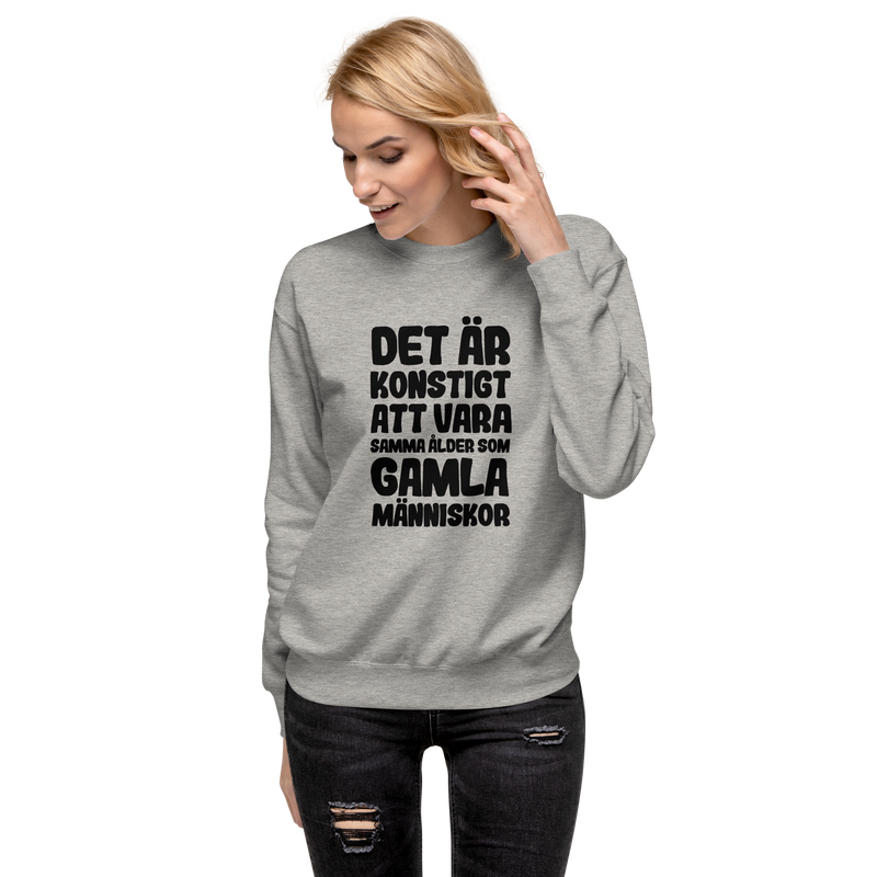 Sweatshirt med texten "Det är konstigt"