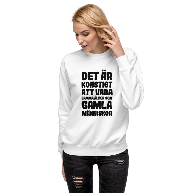 Sweatshirt med texten "Det är konstigt"