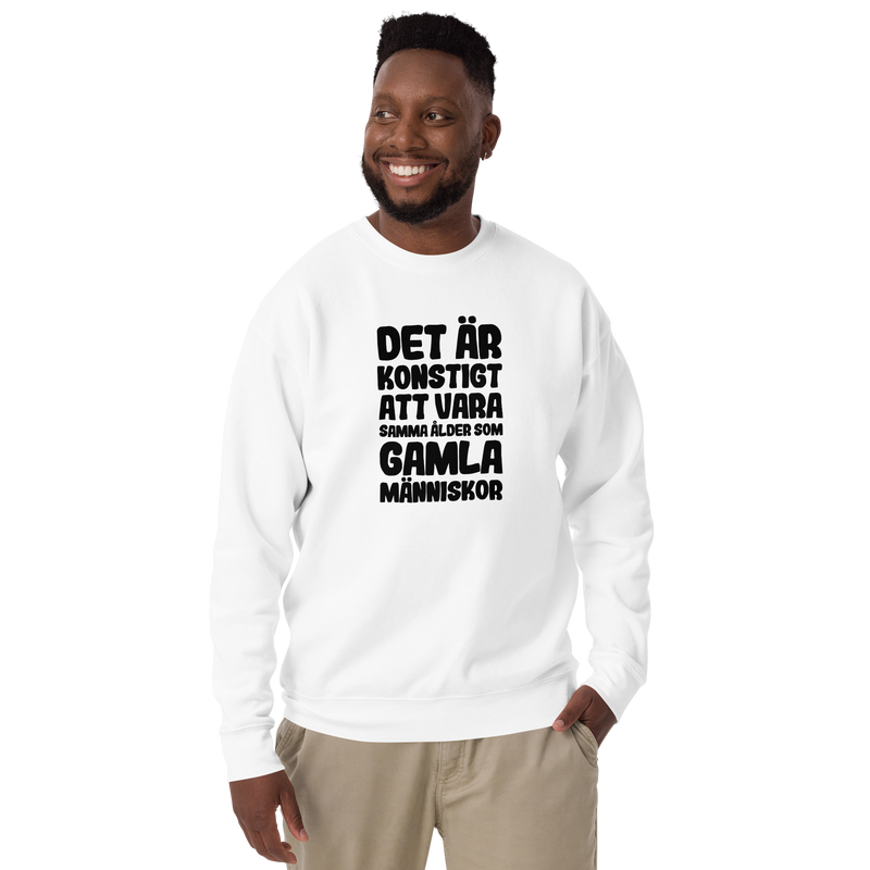 Sweatshirt med texten "Det är konstigt"