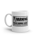 Porslinsmugg med texten "Varning! Vresig gammal gubbe"